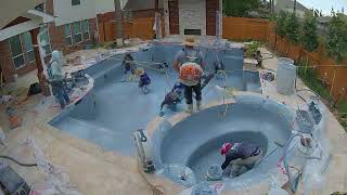 Time lapse install of PebbleTec Pebble sheen - Aqua Blue with Shimmering Sea.  Texas pool build 2023