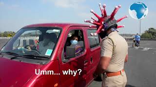 Indian cop confronts coronavirus head-on with handmade helmet