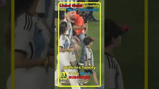 Lionel Messi -  the World Cup trophy with his family
