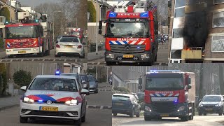 Politie en Brandweervoertuigen met spoed naar een uitslaande middelbrand in flat Heischouw Oss