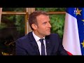 Macron gives first live TV interview