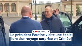 Le président Poutine visite une école lors d'un voyage surprise en Crimée