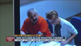 Man charged in shooting of 2 Lakewood officers