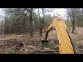 Clearing land for a cabin and cutting in a driveway