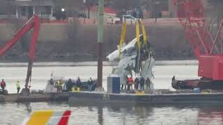 Large portion of American Airlines jet pulled from river after deadly air collision near DC