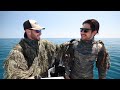 ghillie suit spearfishing 100ft deep with sharks totally surrounded