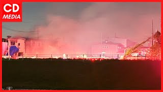 A fierce flame rises from the vicinity of Toyono Industrial Park in Kasukabe City, Saitama April 12