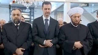 Syrian President Bashar al-Assad attends Eid prayers during ceasfire