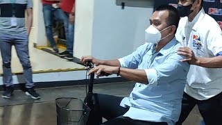 Magnolia coach Chito Victolero rides a mobility scooter after surgery to repair Achilles heal