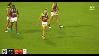 Kai Lohmann kicks a goal in the third quarter for Brisbane