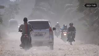 Kondisi Jalan Rusak dan Berdebu di Siak