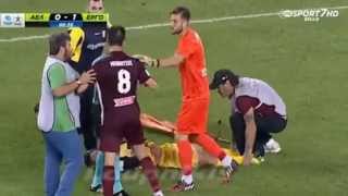 Greek stretcher bearers drop injured player while taking him off pitch!