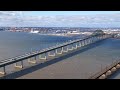 aerial tracking shot of car s crossing newark bay bridge nj turnpike