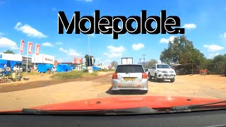 Drive through Molepolole village Botswana.