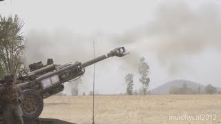 US Marines, Royal Thai soldiers fire artillery rounds down range in Phitsanulok *B-Roll*