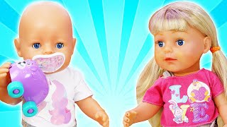 Baby doll dress up & kids pretend play baby dolls - Baby Annabelll doll videos.