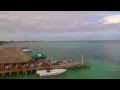 Kelly McGuire at The Palapa Bar in San Pedro, Belize Drone video by Rus Records