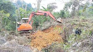 The excavator landed on the shore to prevent water and build the foundation for the house