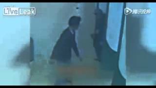 LiveLeak News - Woman gets stabbed twice in buttocks from behind at ATM