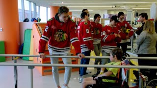 Alex Vlasic visits the pediatric floor on Road To The Discover NHL Winter Classic