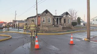 Crews remain at the scene of funeral home fire in Henderson