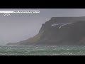 storm henry blows a waterfall backwards .