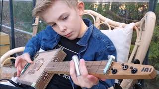 9 year old plays cigar box guitar /Milo Manza - CBG