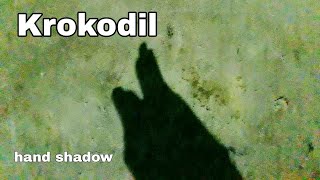 hand shadow puppet Krokodil