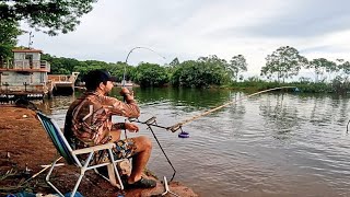 FISHING ON THE PLATFORM..I THREW THE DEAL AND THE TILAPIAS APPEARED, JUST GROSS..