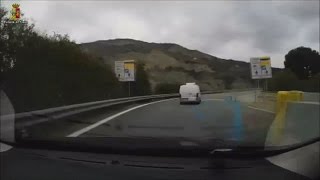 Armed Italian police chase migrant smuggler