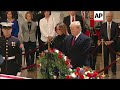 Trump salutes Bush's casket in Capitol rotunda