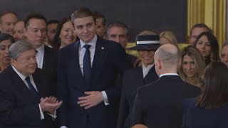 VIDEO | Barron Trump towers over guests at President Trump's inauguration