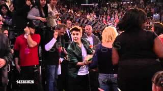 Justin Bieber greets fans at Nickelodeon's 25th Annual Kids' Choice Awards on 3/31/12