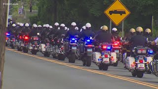 Neighbors gather to pay respects during procession for TFC Aaron Pelletier