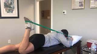 Prone active assisted knee flexion