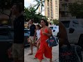 Walking with People on the Sidewalk in WAIKIKI, HAWAII