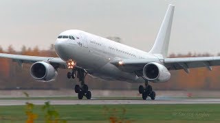 All-white I-Fly Airbus A330-200 smooth landing on a slightly wet runway at LED.