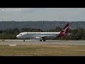 qantas airways vh ebj arrives and qantaslink vh jql departs rw03 at perth airport.