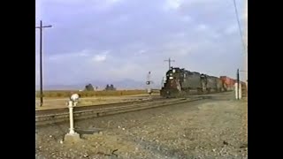 SP SD40T-2 leads a WB double stack train through Edison along Hwy 58