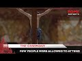 Pope Francis kisses the Cross during the Celebration of the Passion