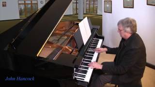 Gnossienne Eric Satie played by myself.  Watch the damper pedal thru top of piano.
