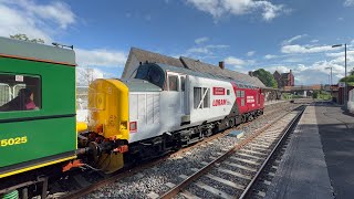 Locomotive (97304) on way for a naming ceremony with Loram (37418) trailing.