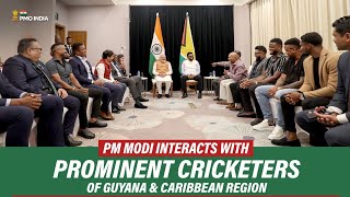 Prime Minister Narendra Modi interacts with cricketers in Guyana