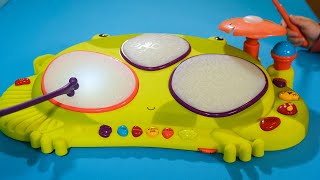 B. TOYS FROG DRUM SET MUSIC \u0026 LIGHTS - RIBBIT-TAT-TAT