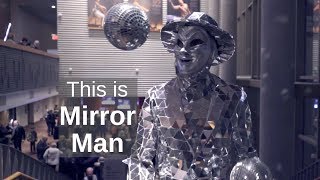 Mirror Man Juggling Disco Balls