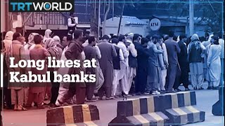 Afghans line up to withdraw cash from Kabul banks