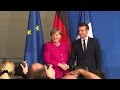 Merkel y Macron dispuestos a cambiar tratados europeos