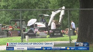 Crews dig up Topeka grave of cold case murder victim