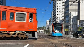 ダイヤモンドクロスを通過する伊予鉄道3000系