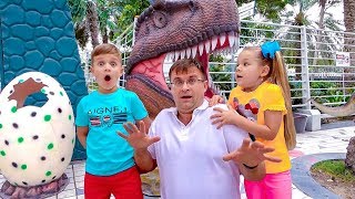 Diana and Roma walk in the Dinosaur park & Museum of Illusions